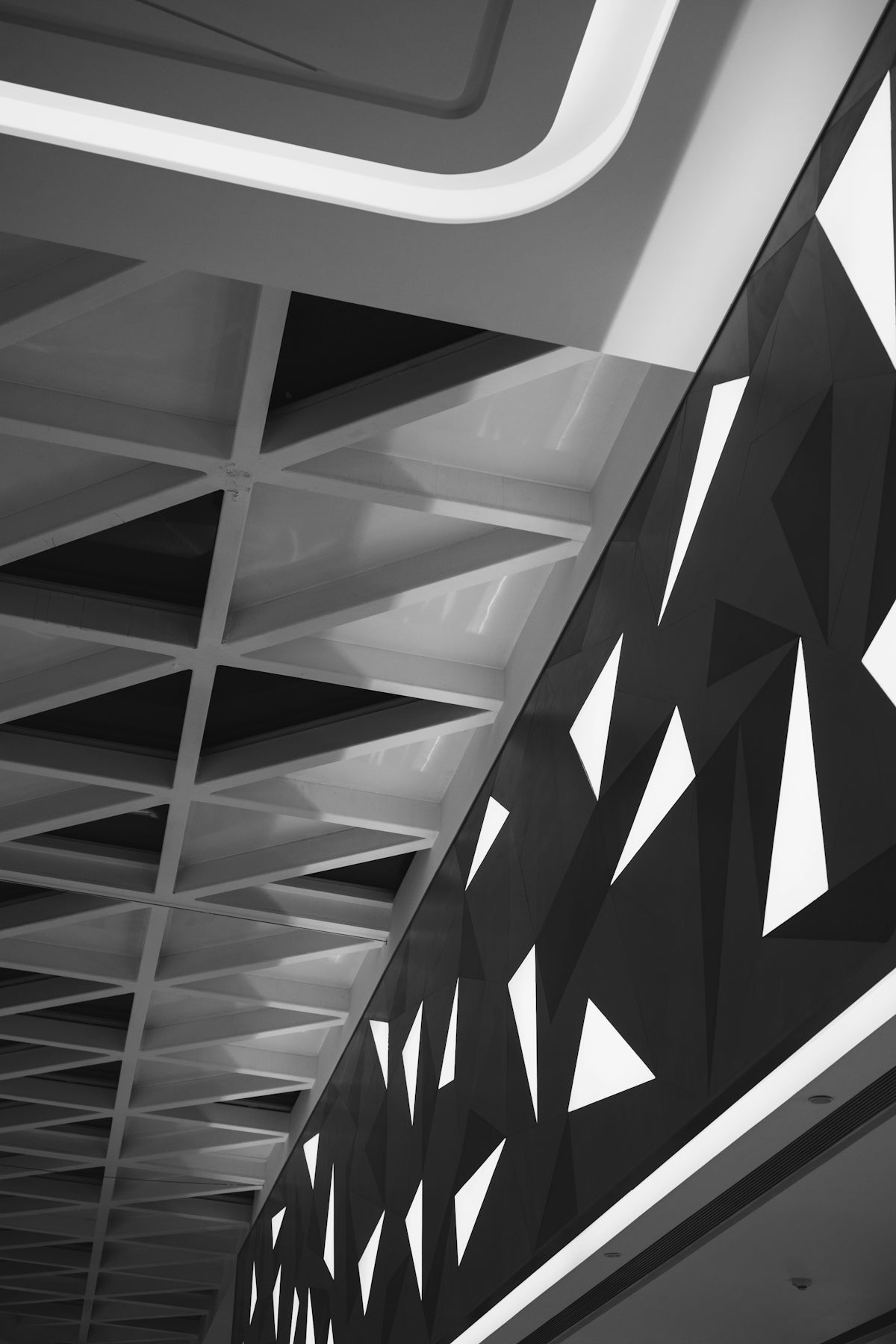 a black and white photo of a ceiling