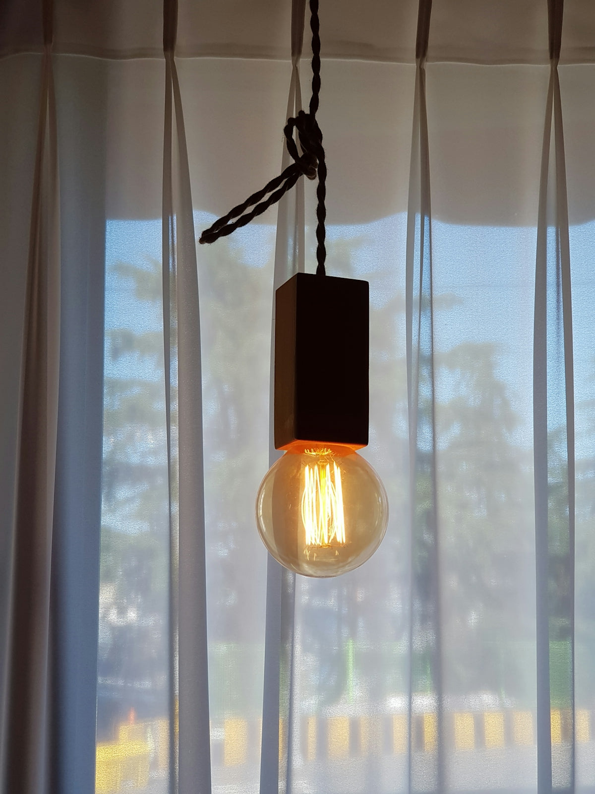 black and yellow pendant lamp