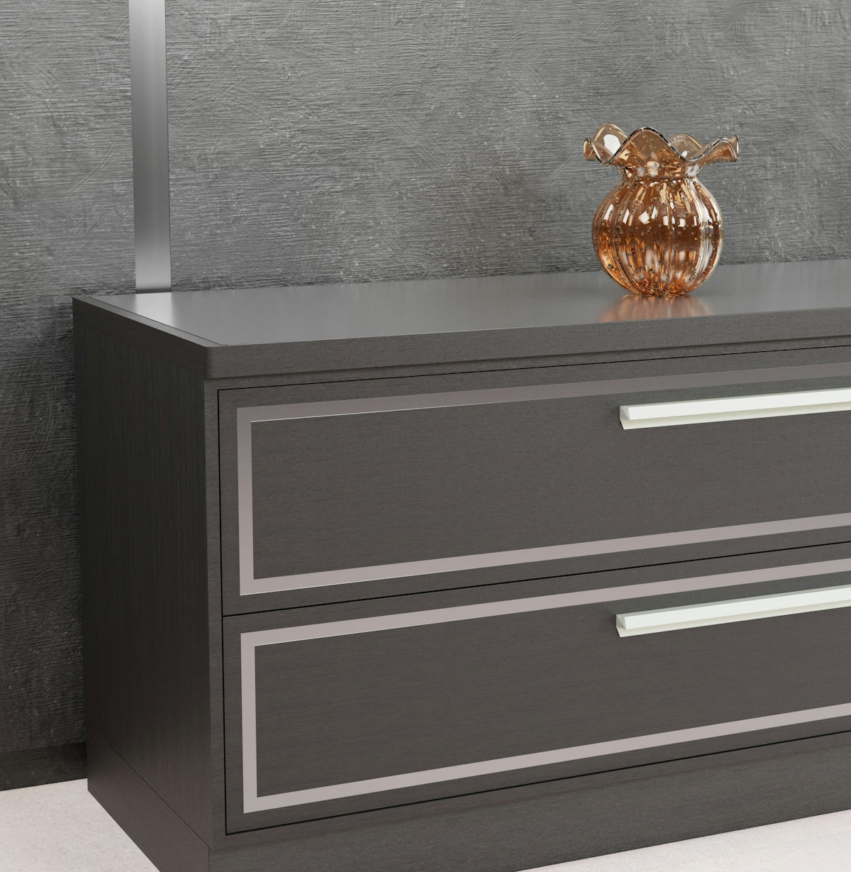 a grey dresser with two drawers and a gold vase on top of it