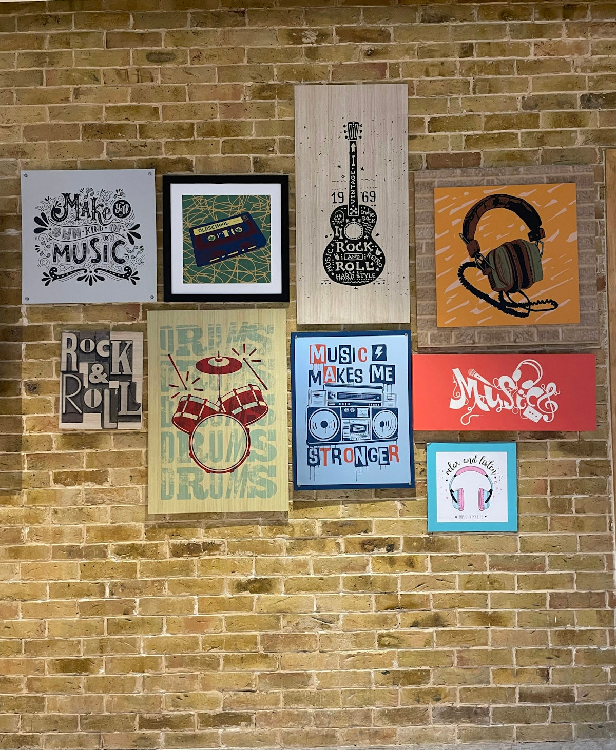 a brick wall with signs on it