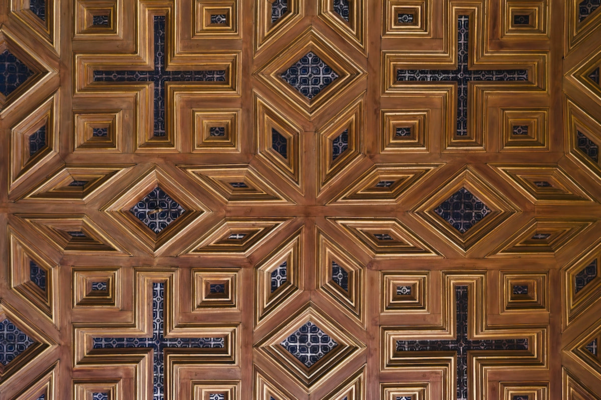 a close up of a wooden wall with a pattern on it