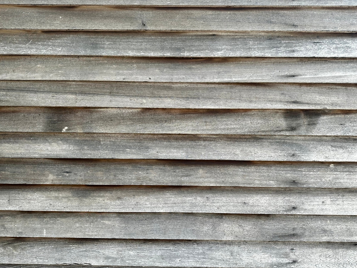 a close up view of a wooden wall