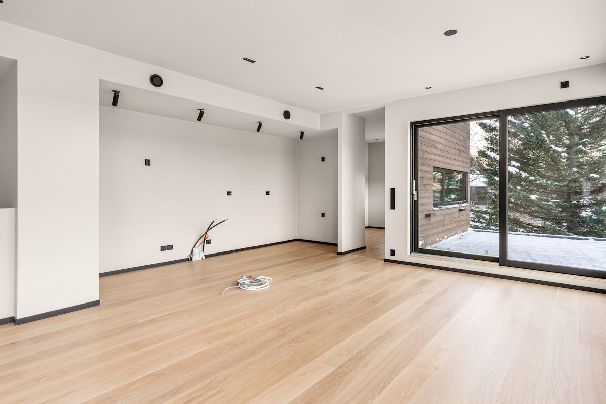 An empty room with a lot of windows