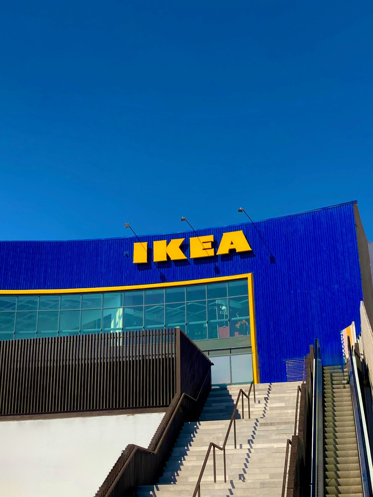 The blue ikea store exterior with yellow logo.
