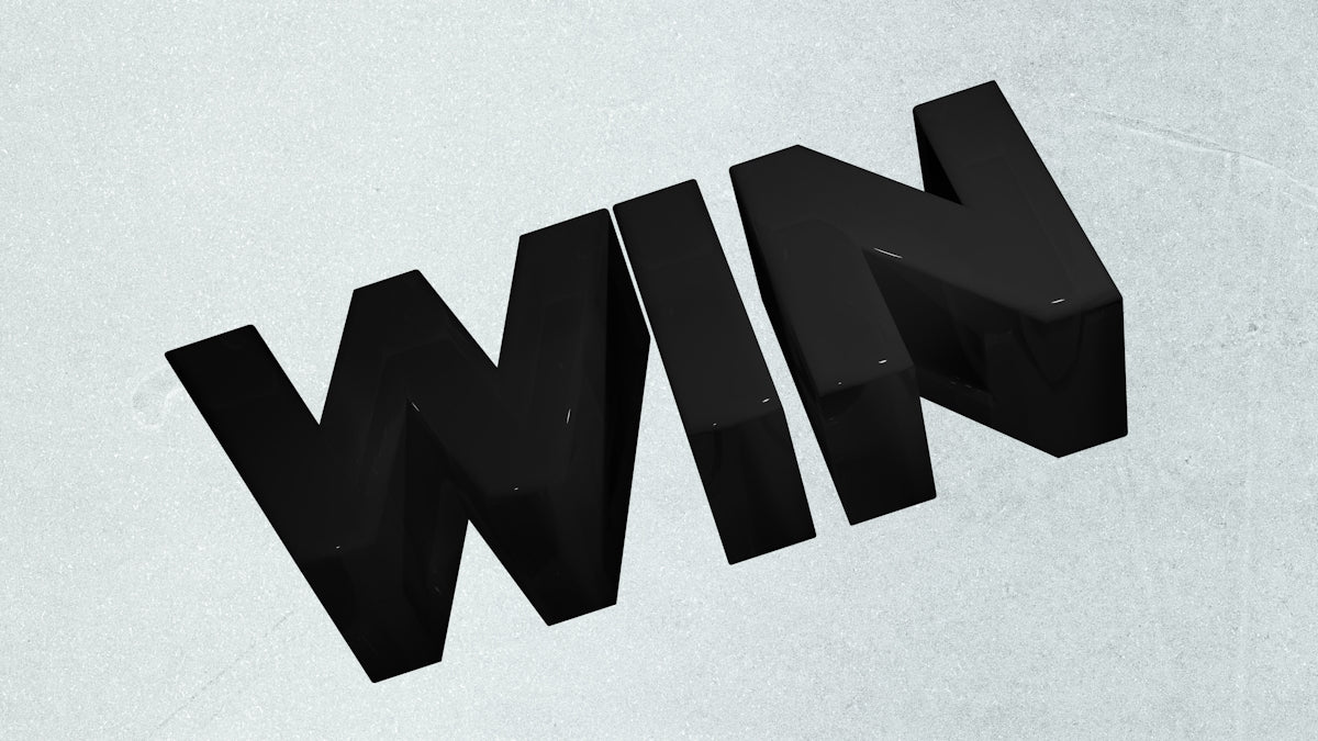 Black 3D letters spelling out the word win