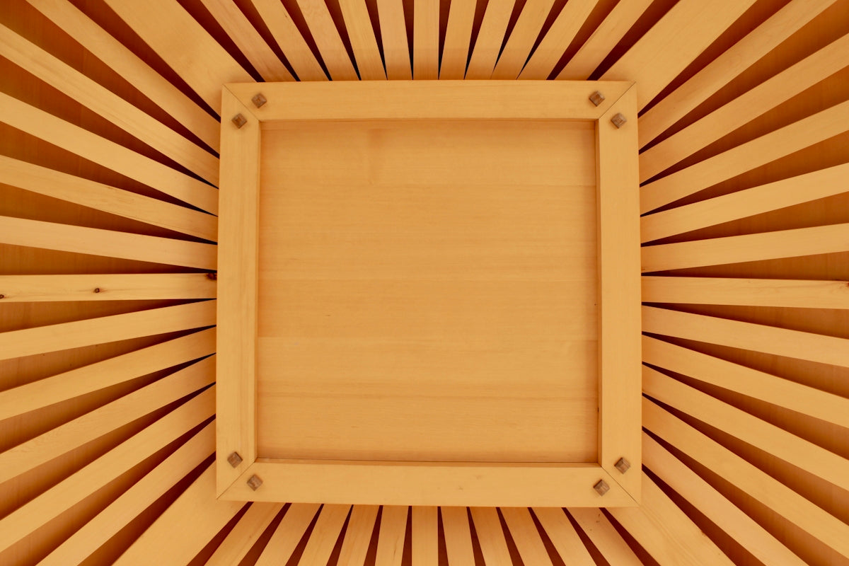 Wooden frame with radiating wooden slats