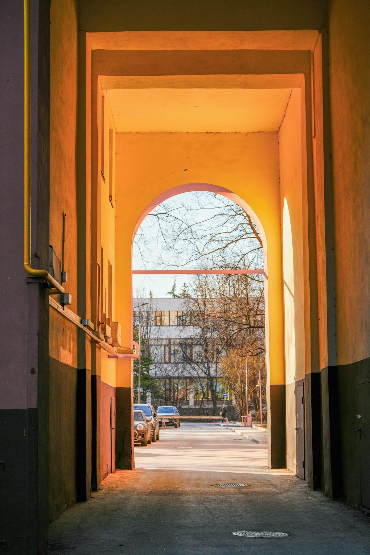 Arched entryway bathed in warm sunset light