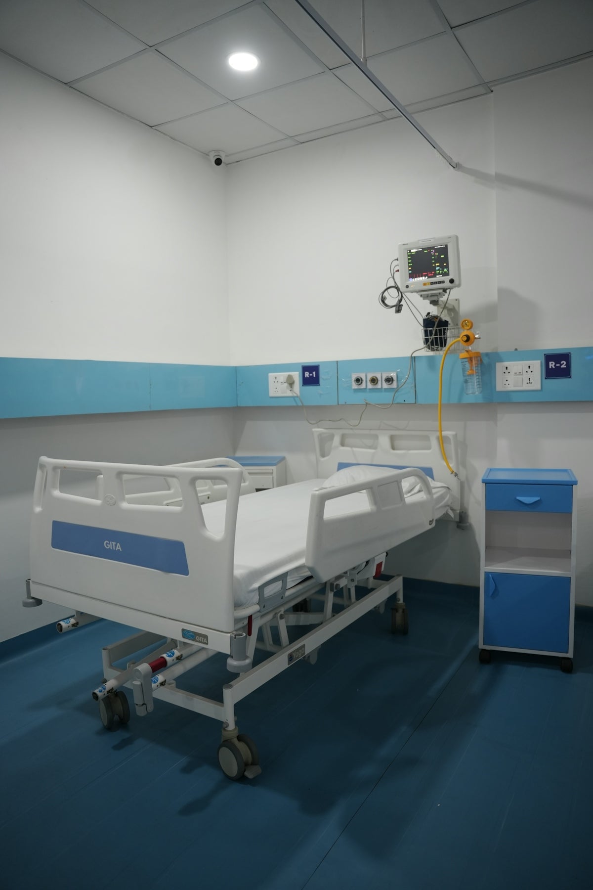Hospital room with medical bed and equipment