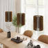 Custom lighting cluster featuring a staggered multi-unit set of narrow slatted wood pendant lamps.